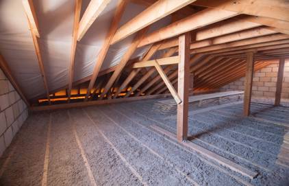 Picture of attic foam insulation. You can see foam insulation spray on attic